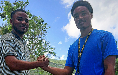 Mitchell Turnbull and Walter Morris pose for photo after winning Entrepreneurship Competition